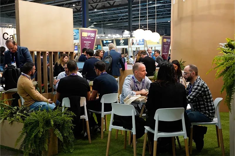 Colorful abstract shapes and patterns with the text '4YFN' prominently displayed, representing the Four Years From Now startup event.